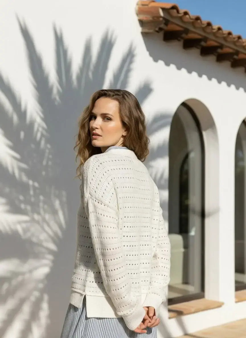 Cream-colored Lavender Robin Sweater with textured knit pattern