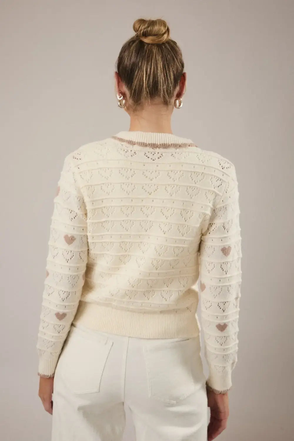 Cream-colored heart cardigan with lacework for Valentine’s Day