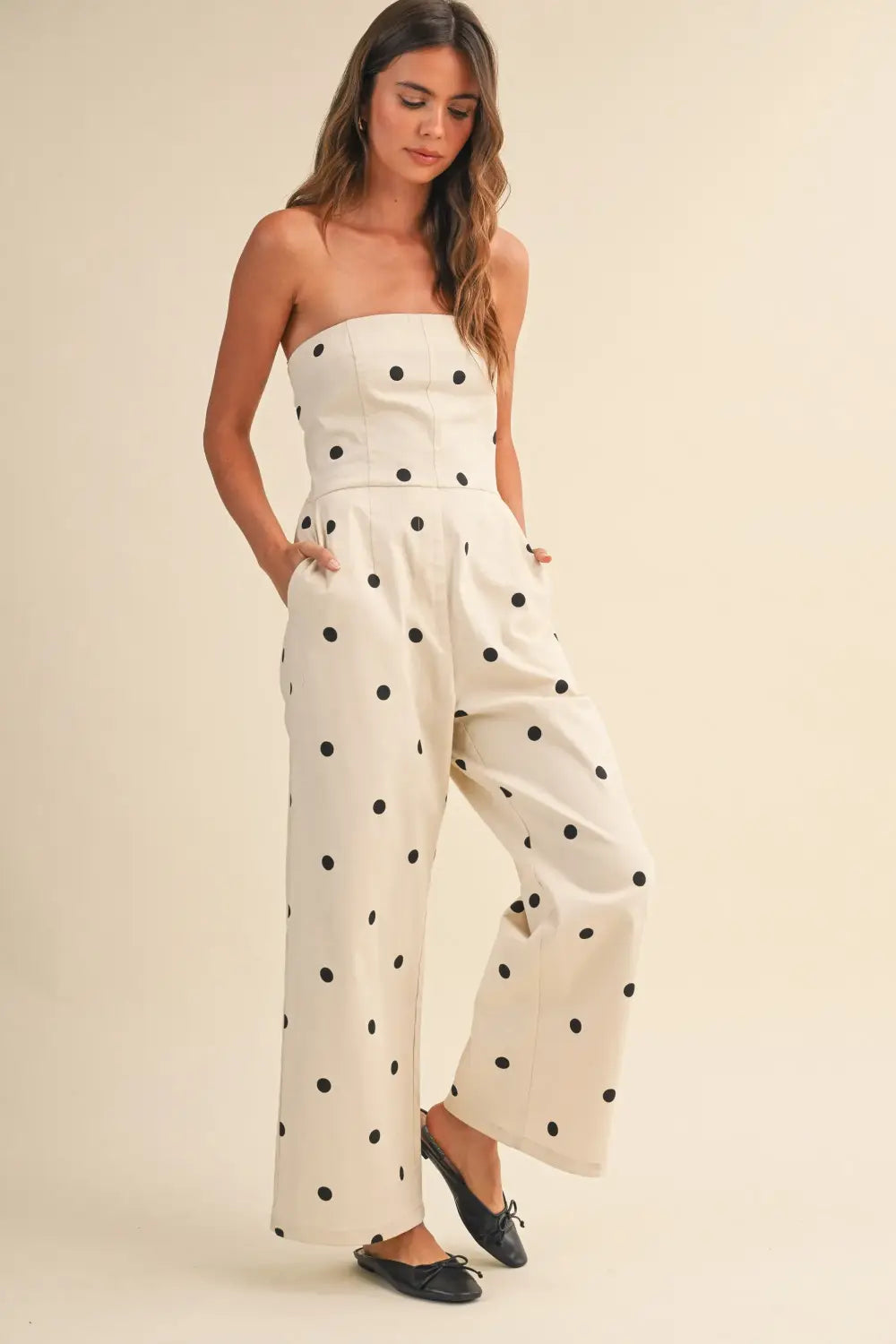 The jumpsuit that does it all: our polka dot strapless wide