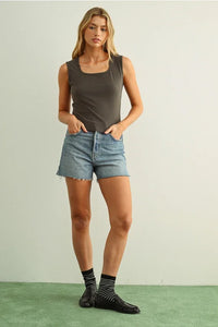 Square neck sleeveless basic top with light-wash denim shorts