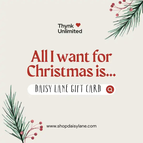 Advertisement for a Daisy Lane gift card with Christmas-themed text and decorative pine branches.
