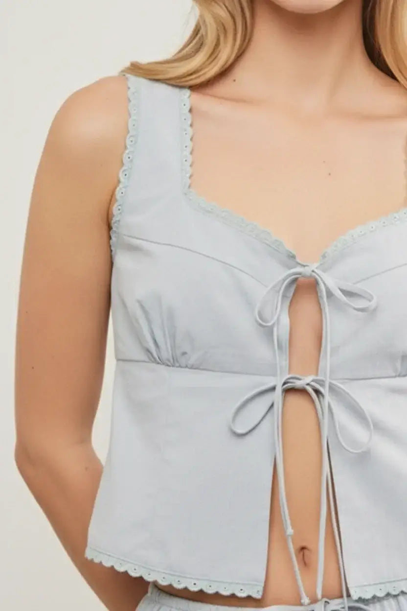 Light blue scallop trim edge sleeveless top with front tie