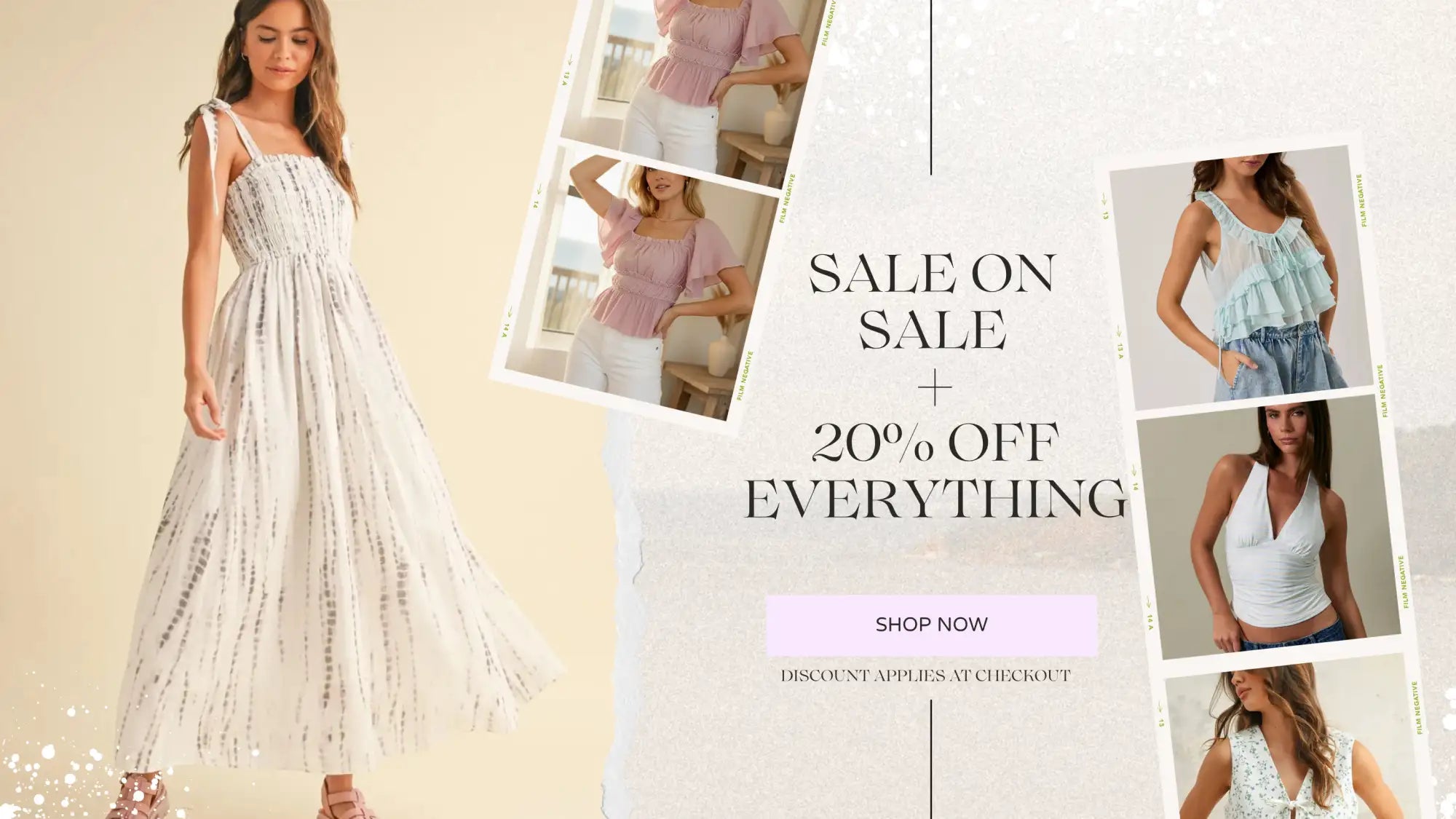 A flowing, off-white maxi dress with delicate silver embroidery and thin spaghetti straps.