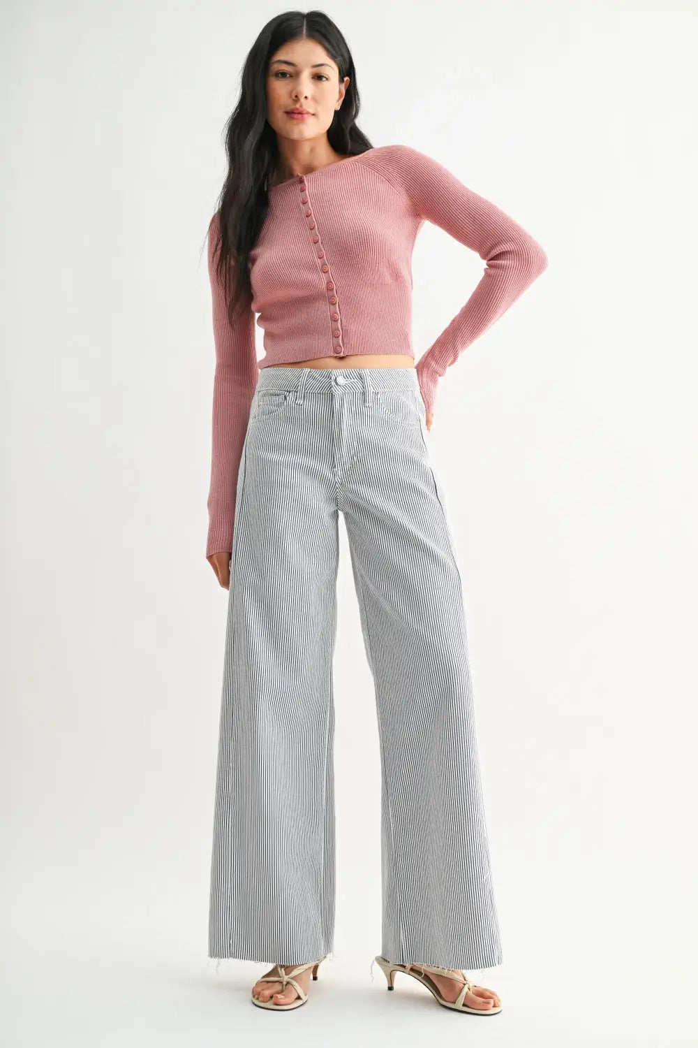 A pair of gray and white vertical stripe wide leg denim jeans crafted from denim fabric for a stylish look.