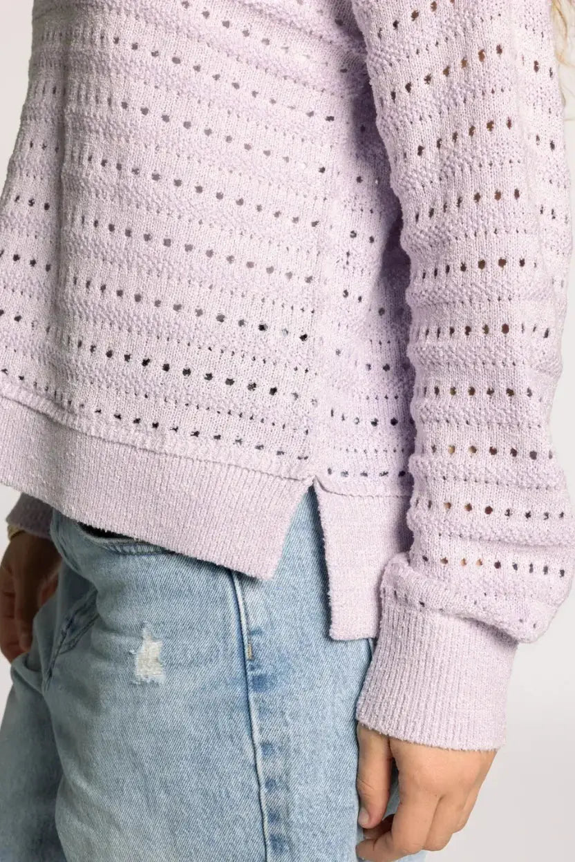 Soft lavender robin sweater with perforated pattern and ribbed cuffs for spring layering