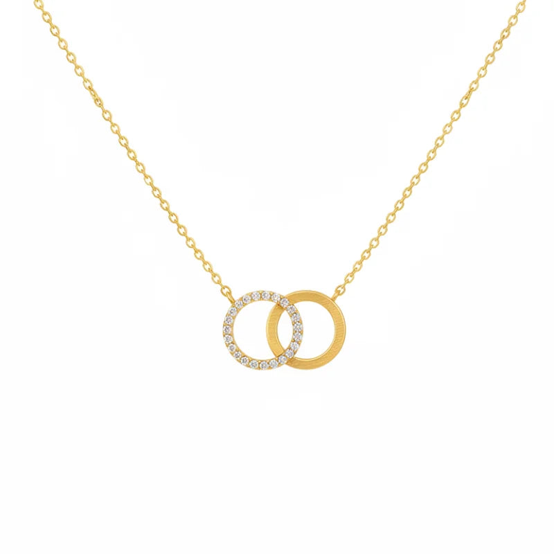 Dainty interlocking circles pendant necklace in 18k gold with diamonds