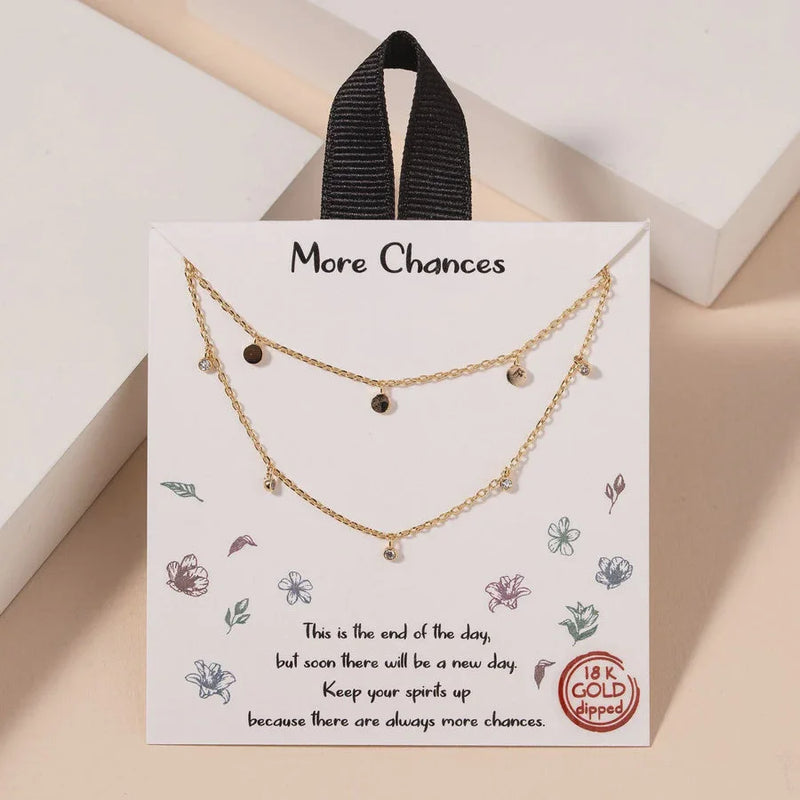 18k gold dipped layered necklace with brown beads and heart charms from Golden Earthy Spirit