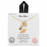 HIVE RULES GOLD Bee Necklace with 18k gold honeycomb design and cubic zirconia accents