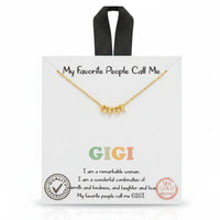 18k gold plated Gigi Golden Spirit Necklace with interlocking letter design