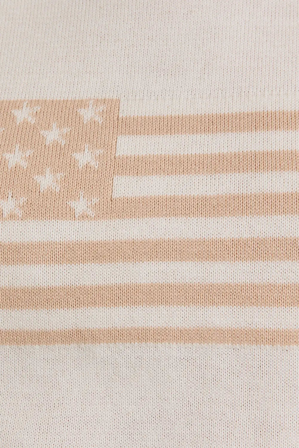 American flag design on fabric of sleeveless USA flag sweater tank with crew neck