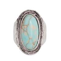 Vintage turquoise ring with antique silver band and stone