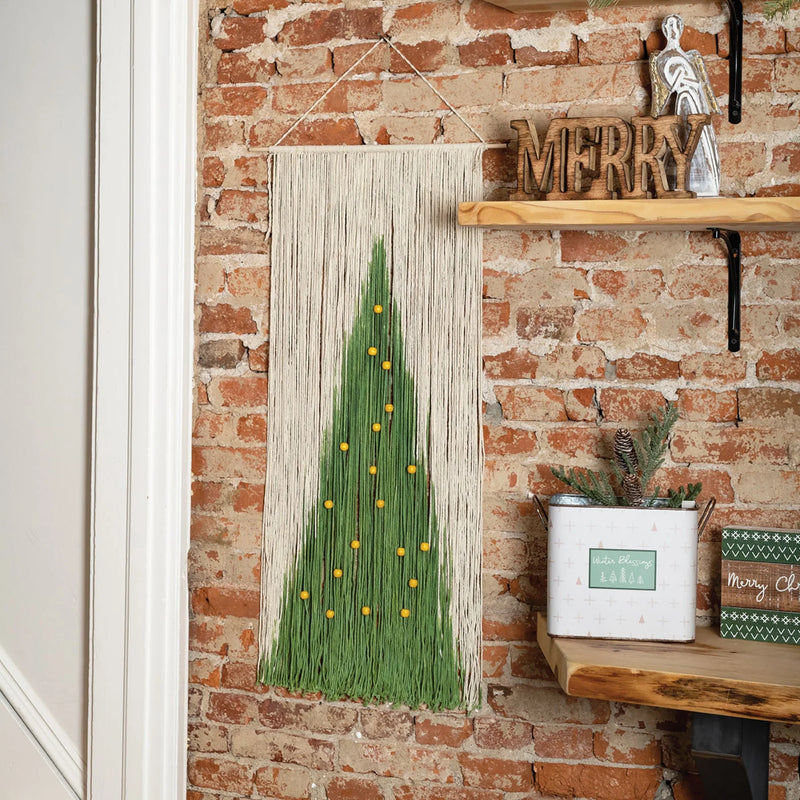 String art Christmas tree with yellow lights on wood, perfect for wall hanging decor