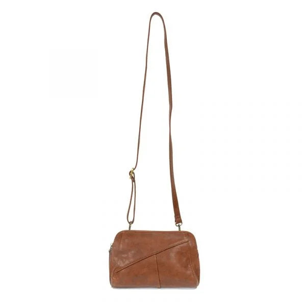 Tan GIGI Crossbody with woven wristlet strap in vegan leather featuring zip closure