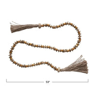 Mango Wood Bead Garland with Jute Tassels showcasing stylish wooden beads in natural tones