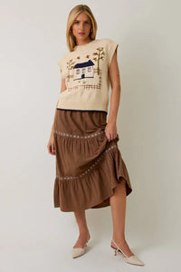 Crow neck sleeveless graphic sweater with beige brown layered ruffled skirt
