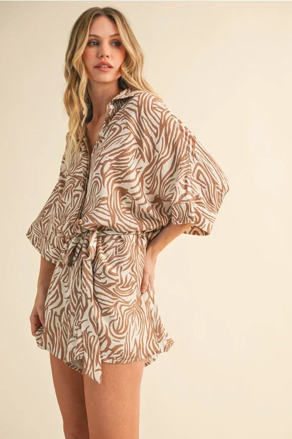 Beige and brown zebra print romper with oversized shirt collar