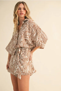 Beige and brown zebra print romper with oversized shirt collar
