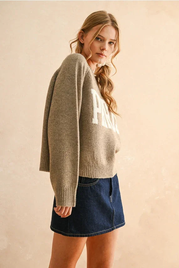 Beige Paris Letter Front Sweater showcasing women’s boho chic clothing from Shop Daisy