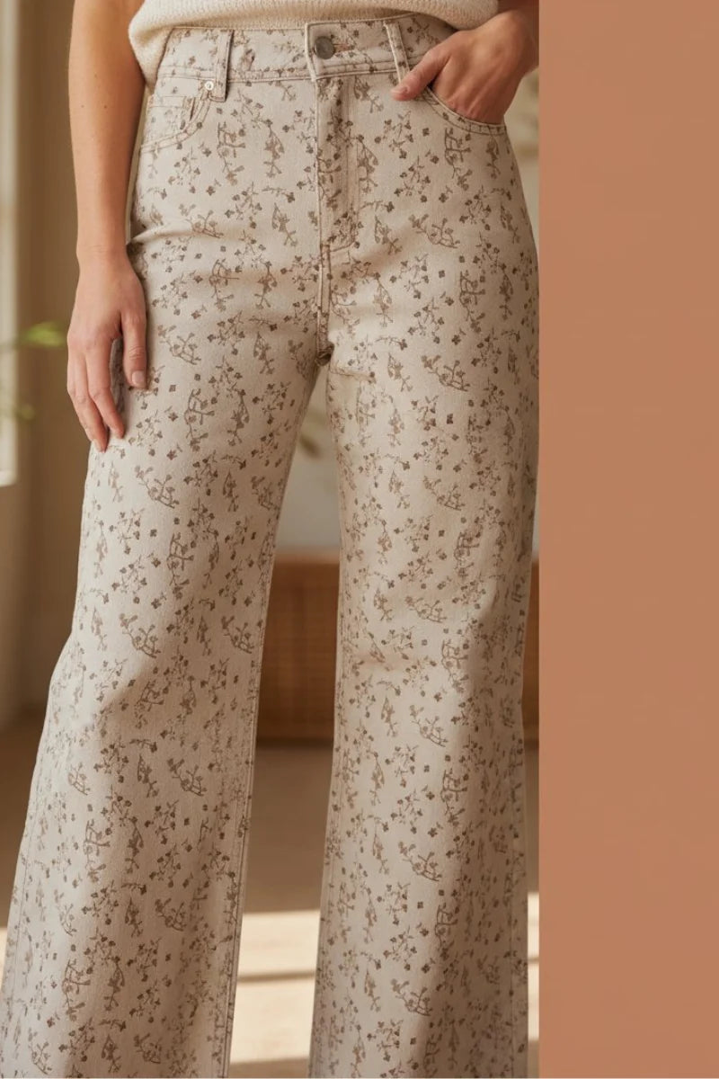 Beige floral print stretched wide-leg pants with high waist and belt loops