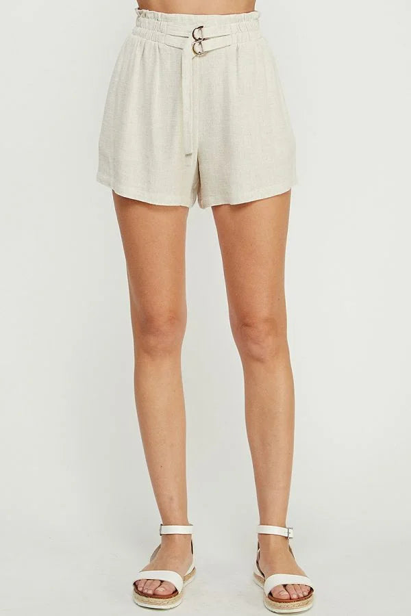 Beige high-waisted soft linen blend shorts with double buckle closures