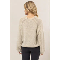 Beige melange knit sweater pullover with raglan sleeves viewed from the back