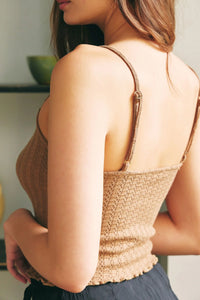 Beige knitted tank top with thin straps, a staple in women’s boho chic clothing