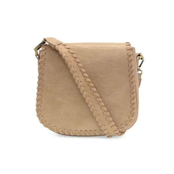 Beige vegan leather crossbody bag with braided trim and adjustable shoulder strap