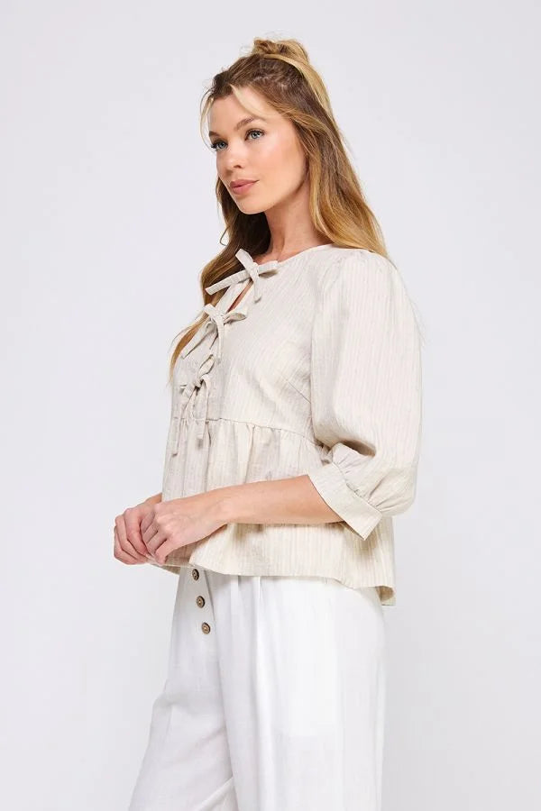 Beige linen jacket with buttons and gathered waist paired with Textured Cotton Blend Blouse