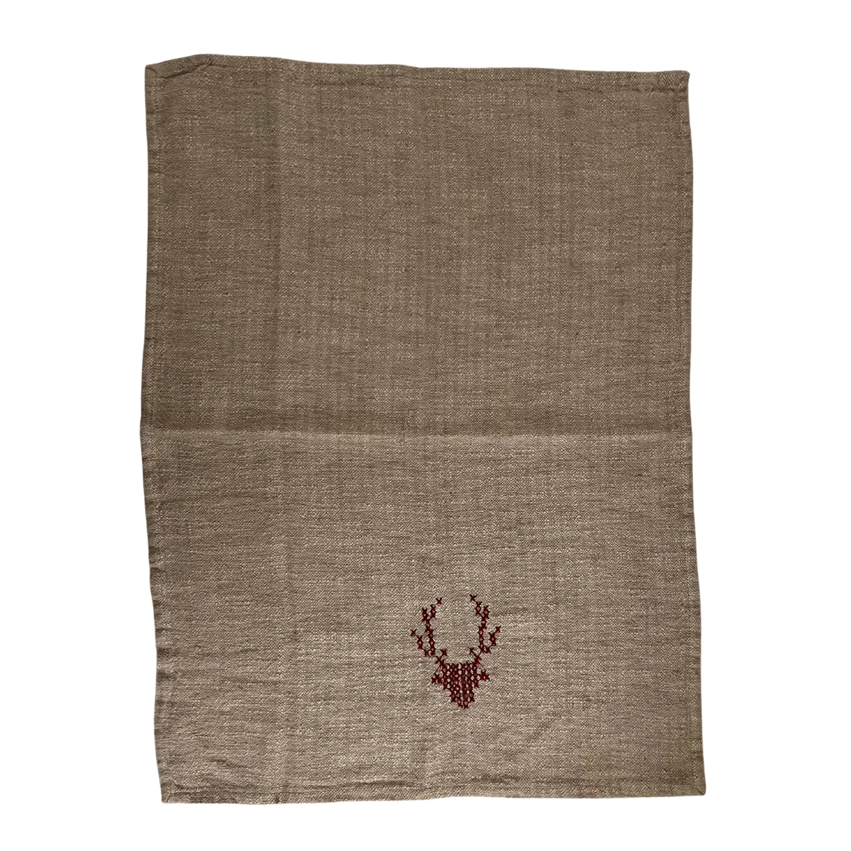 Beige linen tea towel featuring a small cotton embroidered deer head design