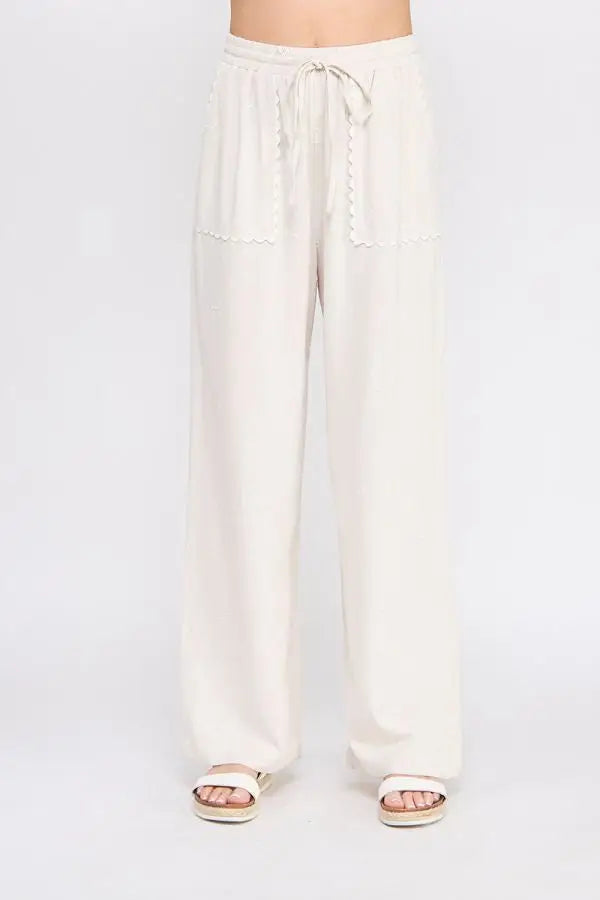 Beige drawstring palazzo linen pants with scallop trim from Bow Embroidered Linen Pants collection