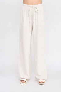 Beige drawstring palazzo linen pants with scallop trim from Bow Embroidered Linen Pants collection