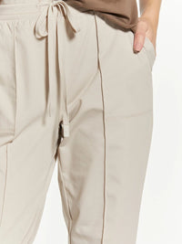 Beige Thread and Supply Paige pants with drawstring, side stripes, pockets