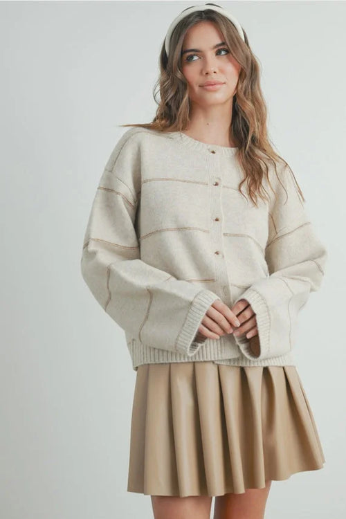 Striped button front cardigan with beige pleated skirt outfit
