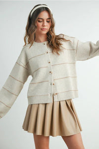 Beige pleated skirt with white buttons in striped cardigan style