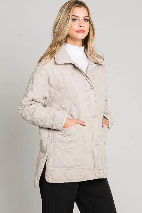 Beige collared button front quilted jacket with high collar and side pockets for women