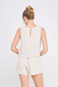 Beige scalloped-edge pajama set featuring square neck tank with scalloped trim and ribbon details