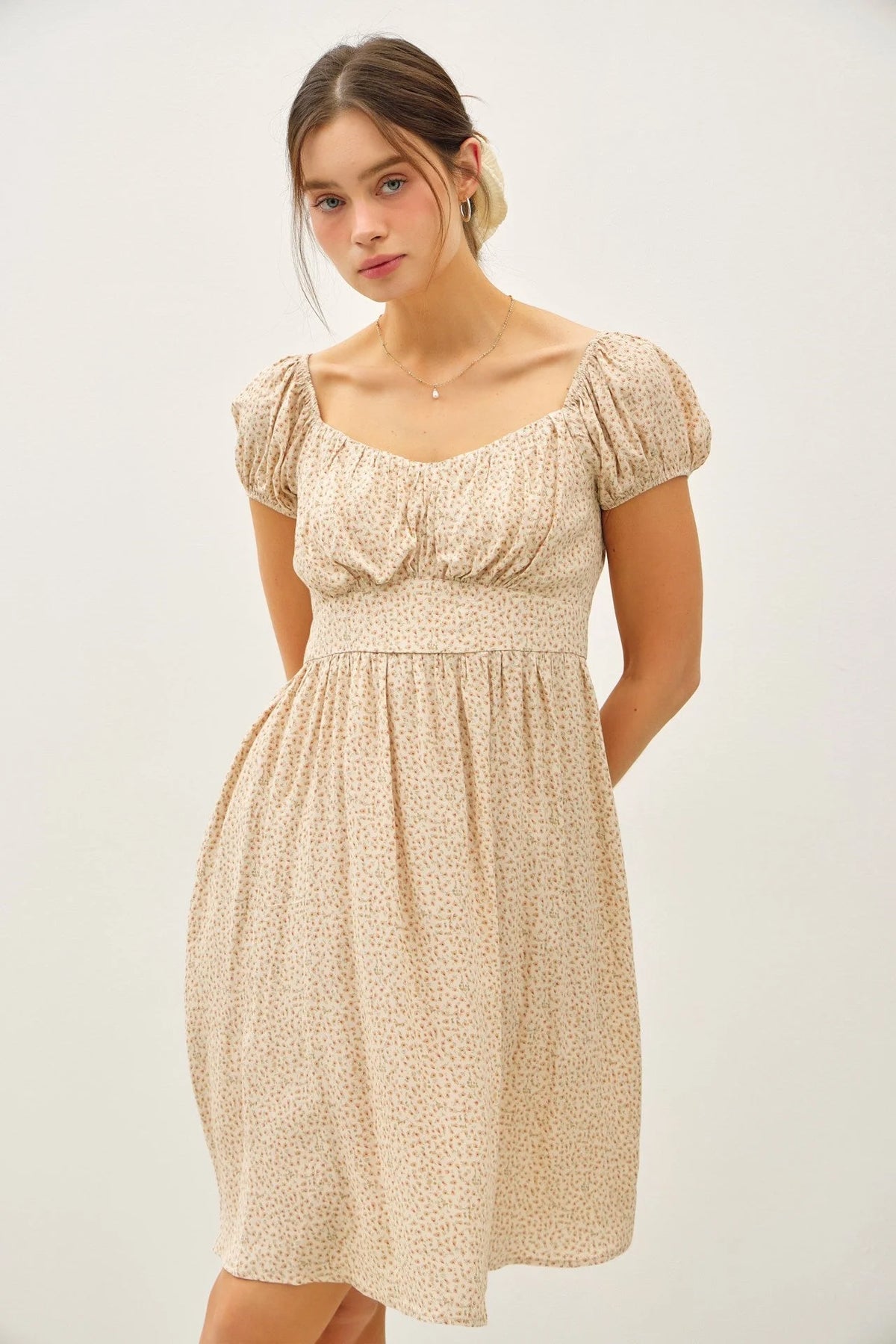 Beige floral print mini dress with puff sleeves and sweetheart neckline for women’s boho chic clothing