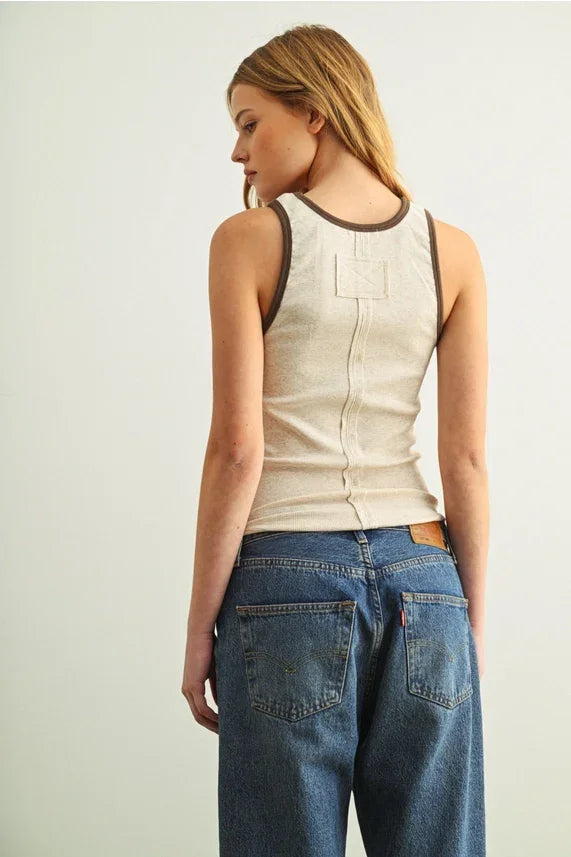 Beige color contrasted tank top with dark brown trim and back seam