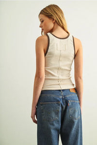 Beige color contrasted tank top with dark brown trim and back seam