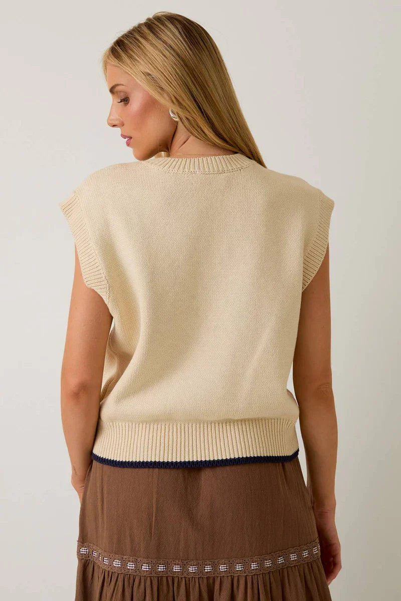 Crow neck sleeveless graphic sweater in beige with navy trim