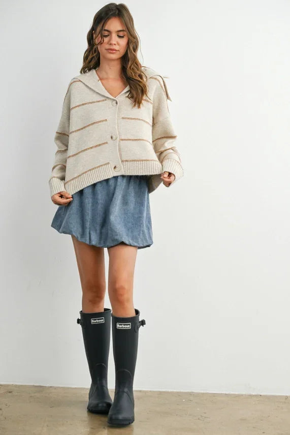 Beige striped collared cardigan with black buttons and pockets