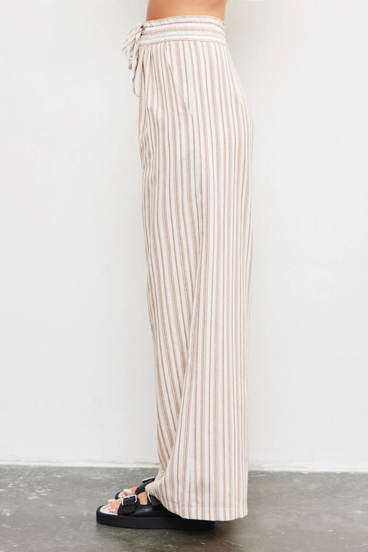 Beige striped wide stripe pants with a tied waist band for stylish comfort