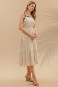 Beige midi dress with black trim from Shop Daisy Women’s Boho Chic Clothing collection