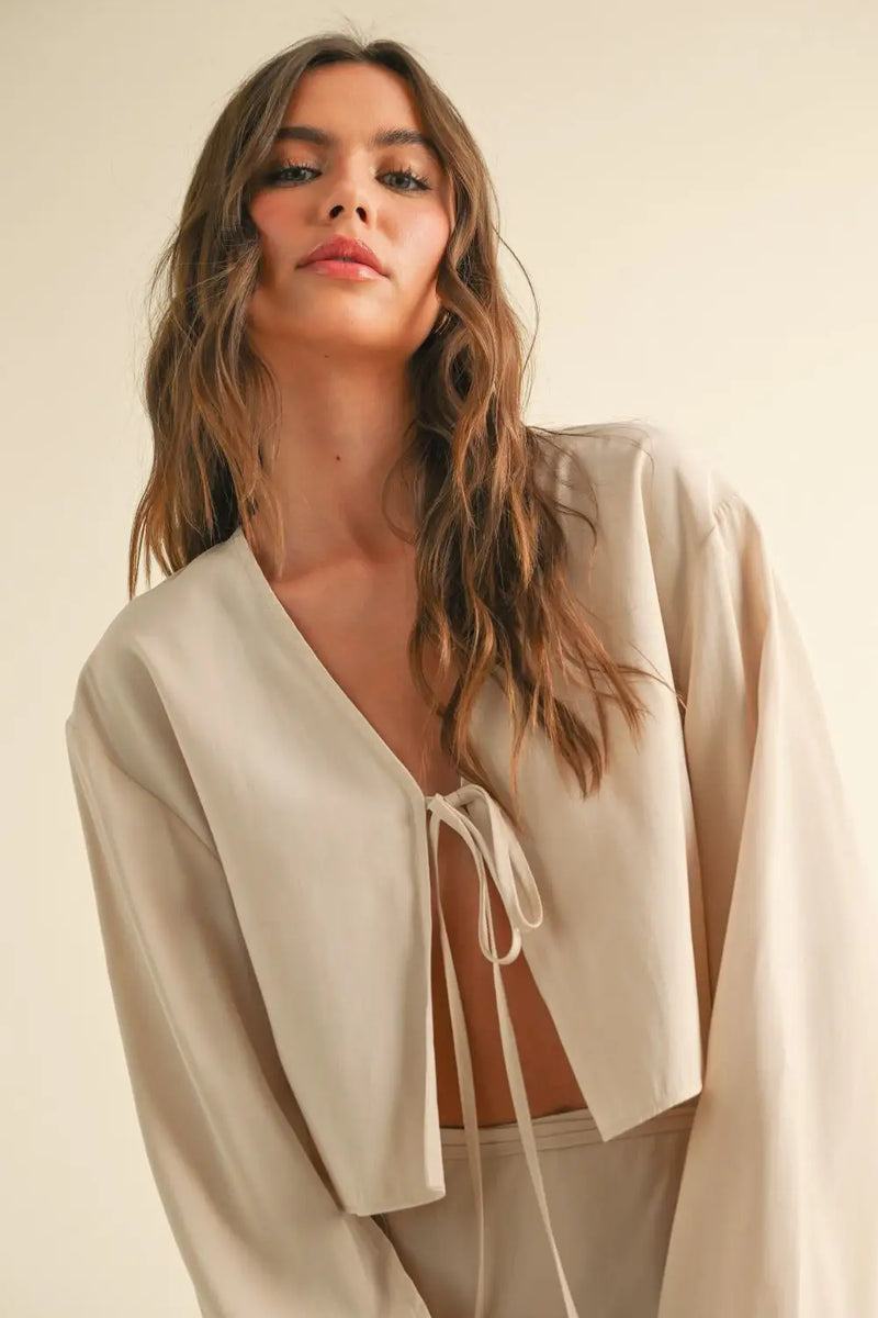 Beige tie-front crop top from Viscose Long Sleeve Tie Front Top for woman’s outfit