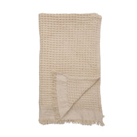 Beige Cotton Weave Blanket with Fringe, a stylish Bohemian throw for any decor