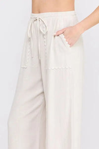 Beige wide-leg linen pants with drawstring waist from Bow Embroidered Linen Pants Scallop Trim