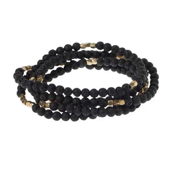 Black beaded wrap bracelet with gold accents from Shop Daisy’s semi precious collection