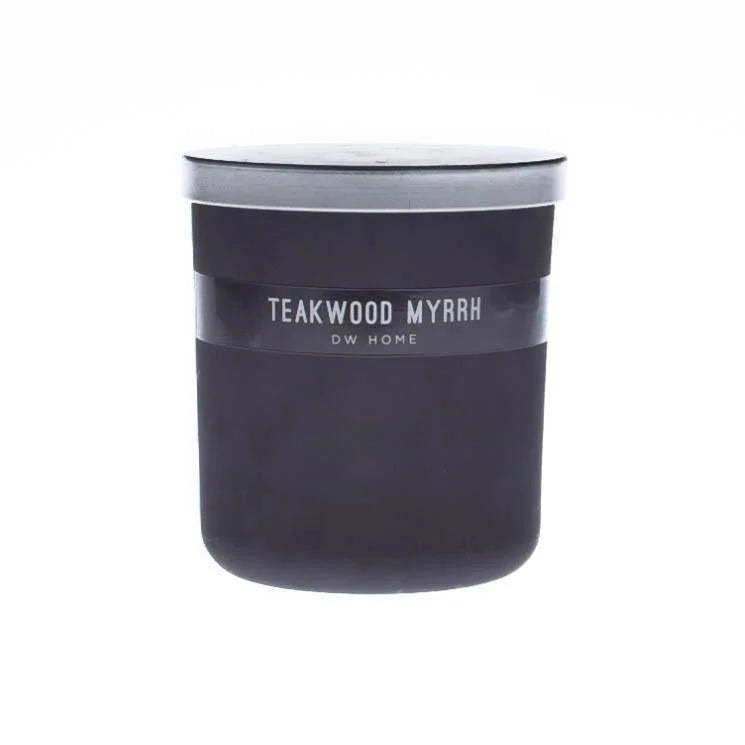 Black Teakwood Myrrh Candle with white lid, perfect for a boho-inspired decor