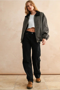 Leopard printed bomber jacket with black corduroy pants and brown suede boots