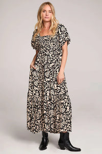 Black and cream floral print Evra Maxi Rayon Ruffle Dress with puff sleeves and square neckline
